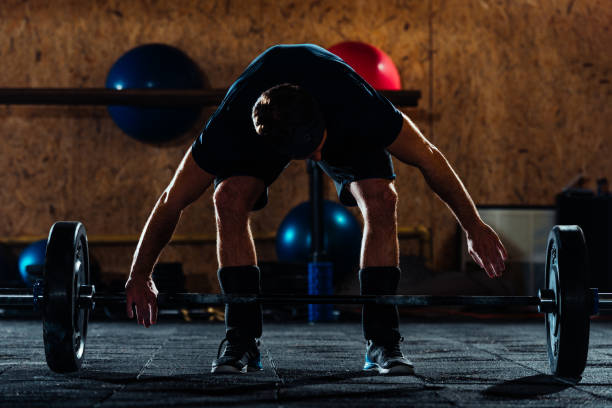istock Man training in the gym 1372753175