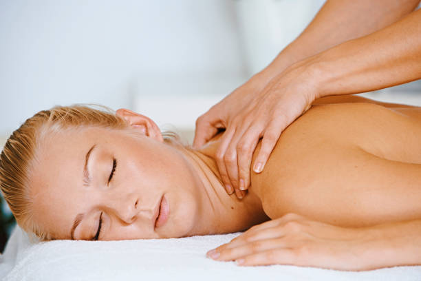 istock Woman giving massage 1372756927