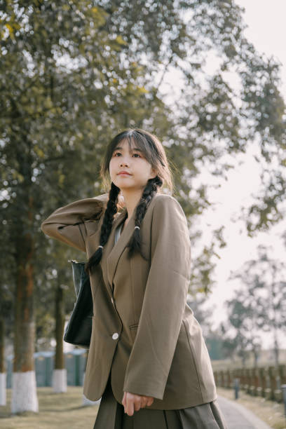 istock Young Asia on the bridge 1372758886
