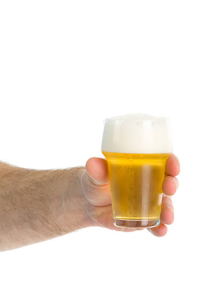 istock Hand holding glass of beer 137275912