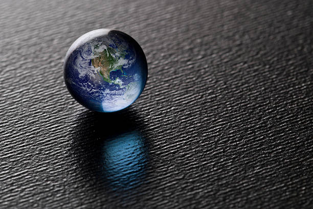 Blue Pearl A Blue Pearl on black (Credit for the Blue Marble goes to  marble globe stock pictures, royalty-free photos & images