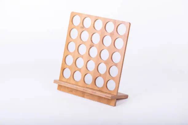 Photo of The small item storage rack made of bamboo is on a white background