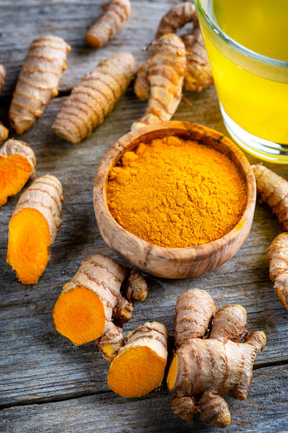 Curcuma longa, powder, rhizomes and tea Curcuma longa, powder, rhizomes and tea. Complementary medicine turmeric stock pictures, royalty-free photos & images