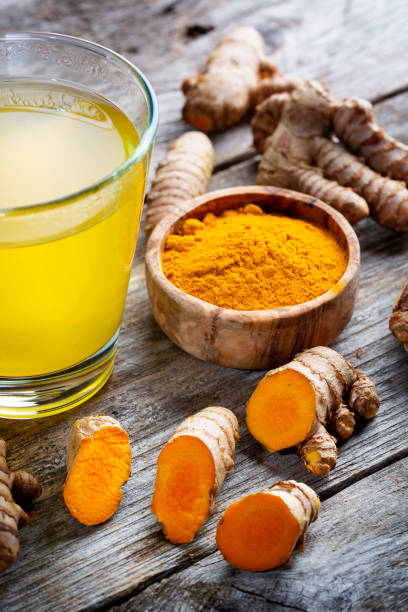istock Curcuma longa, powder, rhizomes and tea 1372767812