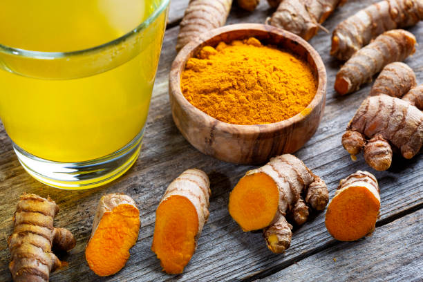 istock Curcuma longa, powder, rhizomes and tea 1372767827