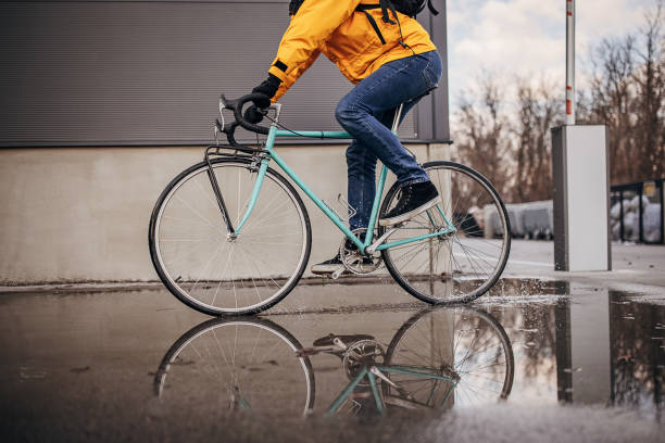 istock Man riding bicycle in city 1372769848