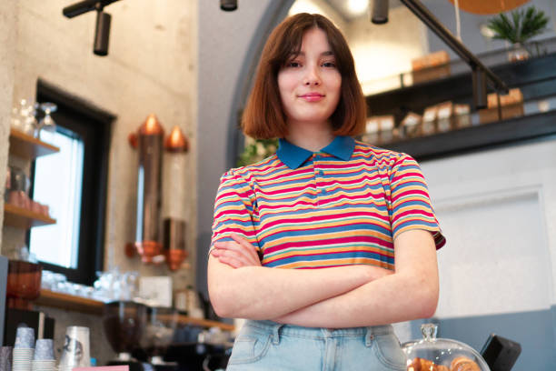 istock Witress in coffee shop 1372770725
