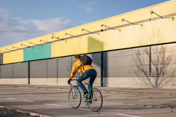 istock Man riding bicycle in city 1372771136