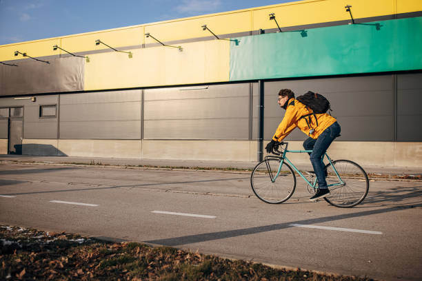 istock Man riding bicycle in city 1372771164