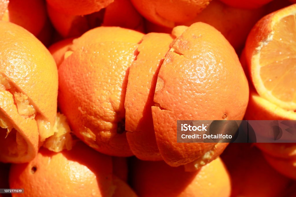 Oranges and orange peels, wallpaper, Germany Oranges and orange peel, wallpaper, Germany Color Image Stock Photo
