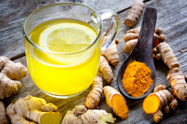 istock Curcuma longa, turmeric and ginger, powder, rhizomes and tea 1372776273