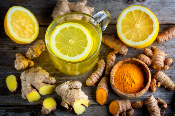 Curcuma longa, turmeric and ginger, powder, rhizomes and tea Curcuma longa and ginger, powder, rhizomes and tea. Complementary medicine turmeric stock pictures, royalty-free photos & images