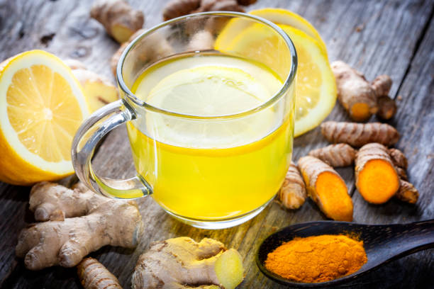 istock Curcuma longa, turmeric and ginger, powder, rhizomes and tea 1372776336