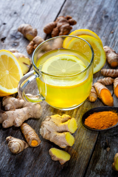 istock Curcuma longa, turmeric and ginger, powder, rhizomes and tea 1372776350