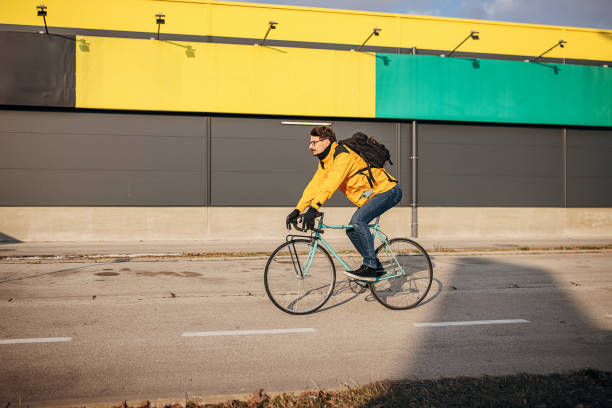 istock Man riding bicycle in city 1372777783