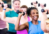 istock Senior African-American woman in exercise class 1372782298