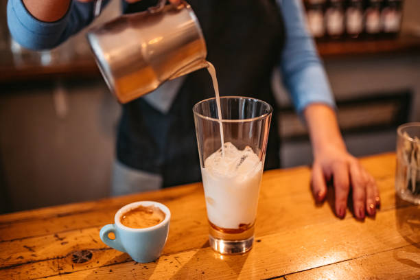 istock Bartender making Frappuccino with whipped cream 1372782908
