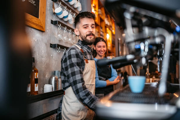 istock Baristas making coffee 1372783942
