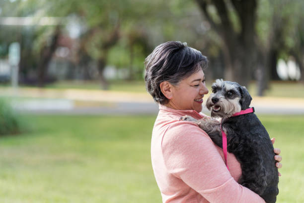 istock Affectionate woman with dog 1372791124