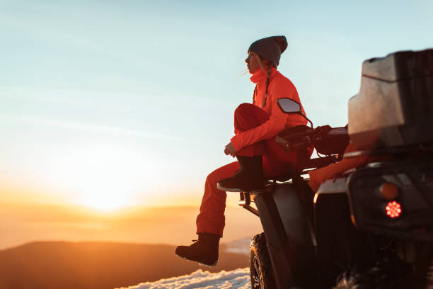 girl on atv - off road vehicle snow 4x4 driving imagens e fotografias de stock