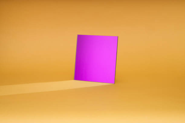 Purple mirror on yellow background