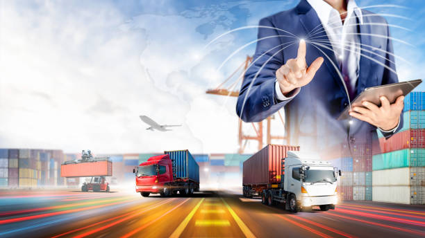 istock Businessman touching virtual screen world map of Global logistics network distribution, Container cargo freight ship at industrial port for logistics Import export background, Smart technology concept 1372802913