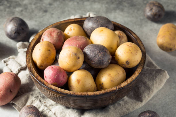 istock Raw Organic Baby Potatoes 1372804247