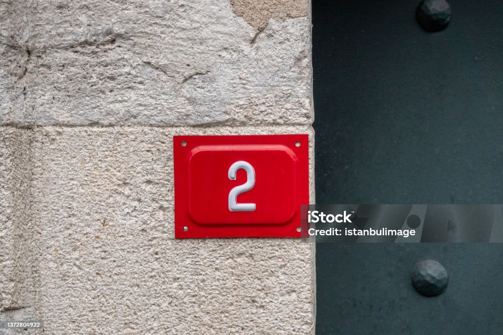 Number Two On A Wall. Number Two On A Wall, Detail Of A Number Of Information On A Wall Of A House. Number 2 Stock Photo