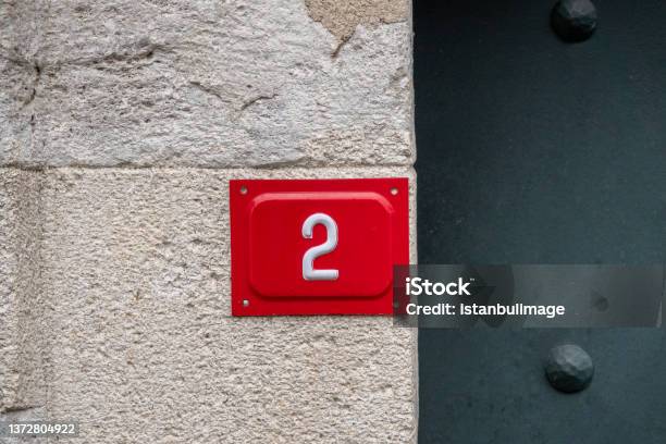 Number Two On A Wall Stock Photo - Download Image Now - Number 2, Backgrounds, Business