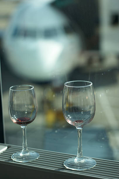 istock Two Wine glasses before boarding aircraft 137281359