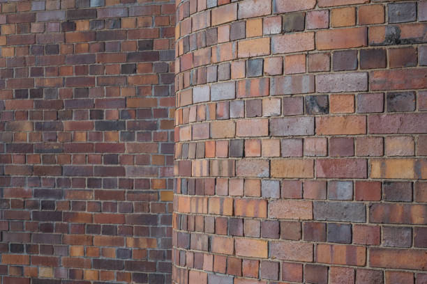 red brick wandtextur als hintergrund - corner stone wall brick stock-fotos und bilder