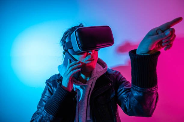 istock Woman with virtual glasses talking with cell phone 1372823146