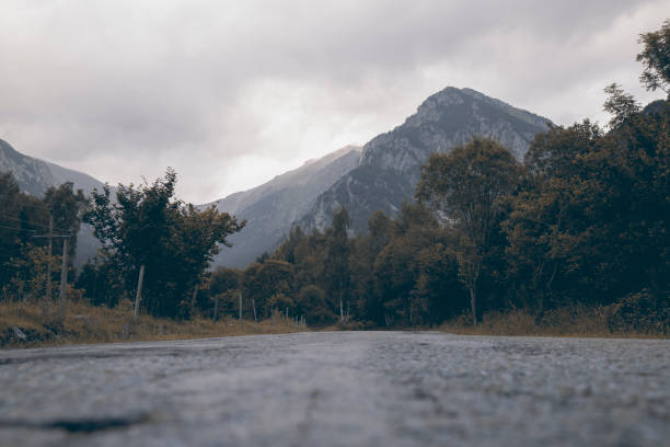 istock High mountain and a road 1372828938