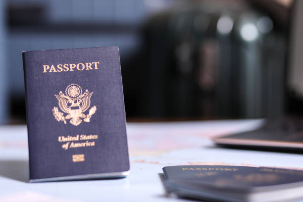 istock Travel: USA Passports, luggage. 1372829784