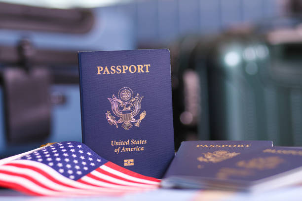 istock Travel: USA Passports, American flag. 1372829801