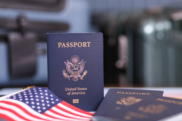 istock Travel: USA Passports, American flag. 1372829852