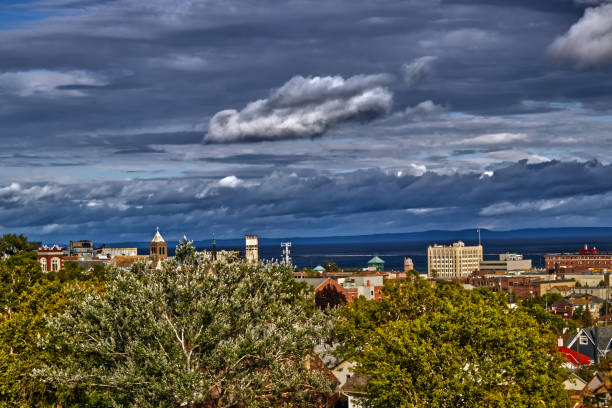 istock Brightly lit town with all grey above the Lake Superior - Thunder Bay, ON, Canada 1372830181
