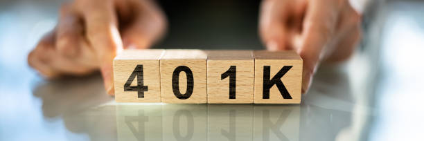 istock Woman With 401K Blocks 1372831619