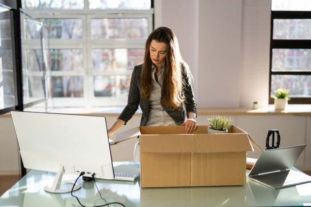 istock Job Quit. Employee Holding Cardboard Box 1372831646