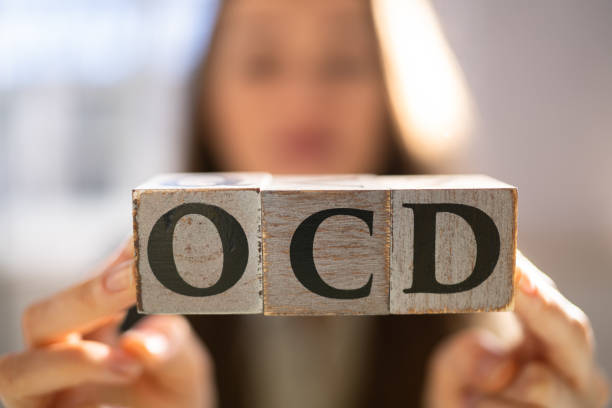 ocd perfektionistische besessenheit - obsessiv stock-fotos und bilder