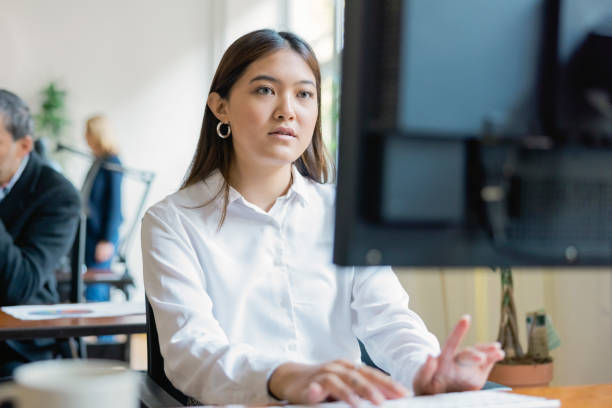 istock Asian businesswoman working on desktop computer in office 1372834461