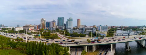 Photo of Aerial skyline of Tampa, Florida. Distant view of Downtown Tampa over the Hillsborough River and big transport junction.Extra-large, high-resolution stitched panorama.