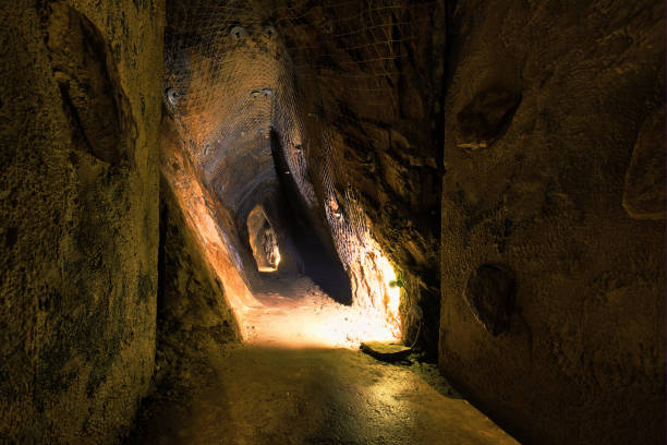 istock The interior of a corridor carved out of solid rock. 1372837654