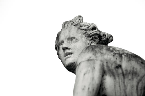 istock Black and white old statue of young man, white background with copy sapce 1372844096