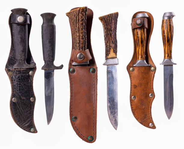 istock Various types of hunting knives with leather holsters. 1372844323