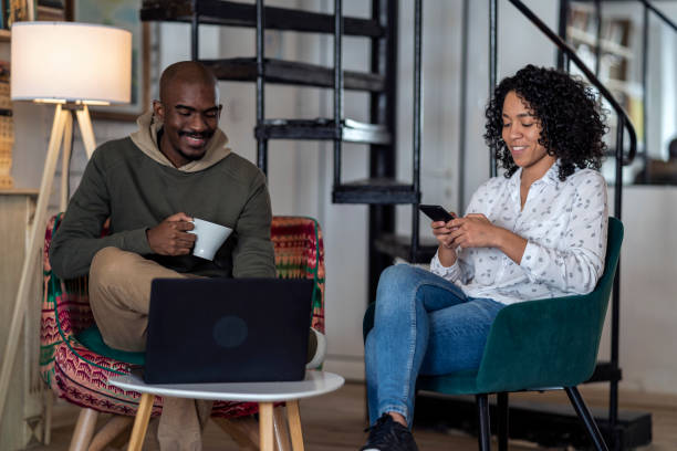istock An Afro couple is talking today and surfing the internet. 1372845534