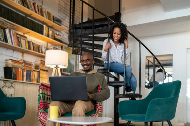 istock An Afro couple is talking today and surfing the internet. 1372845541