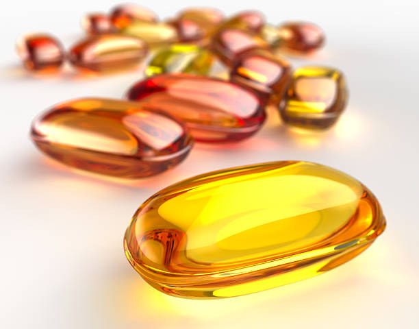 гель капсула таблетка - vitamin e lecithin nutritional supplement vitamin pill стоковые фото и изображения