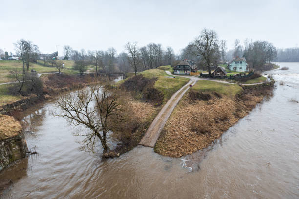 Flood in spring day. An island has formed at the Venta River waterfall, Kuldiga, Latvia.