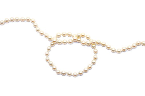 Jewelry - Antique Pearl Necklace tied in a loose knot